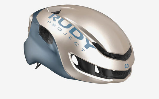 Casque Nytron      Couleur: Champagne/Blue Avio Metal Shiny 2026 )