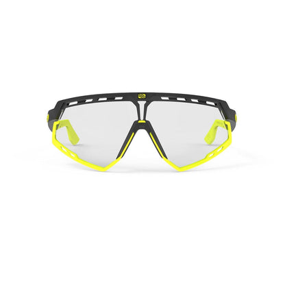 LUNETTES DEFENDER /MONTURE NOIRE MATE ET VERRES IMPACTX-2 PHOTOCHROMIQUES TRANSPARENTS À NOIR LASER PARE-CHOCS JAUNE FLUO E-LUNETTES RUDY PROJECT 